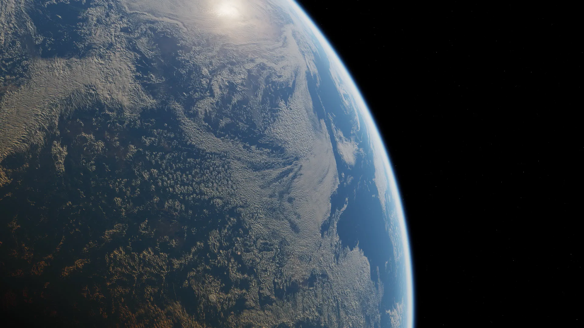 Sun glint over the ocean with clouds casting shadows